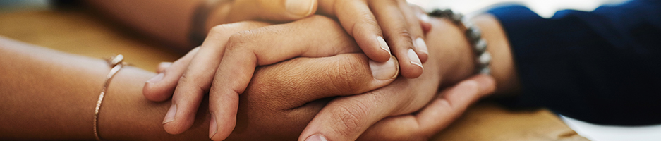 Community Services, VETDSS - close up view of holding hands