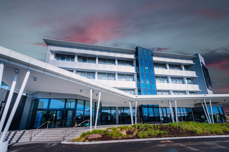 Image of The Gordon main entrance and building at dusk.