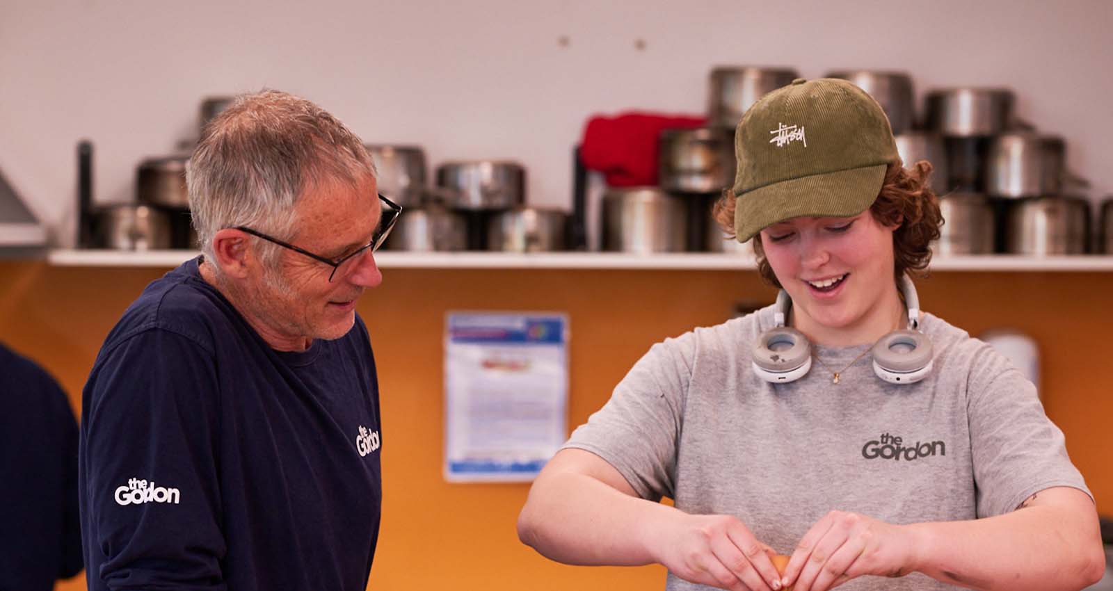 VET student under instruction from a teacher